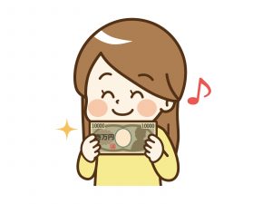 お金を持った嬉しそうな女性