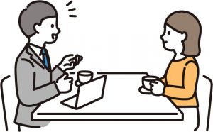 相談に乗る弁護士と相談者の女性