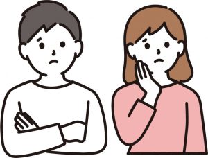 悩む男女